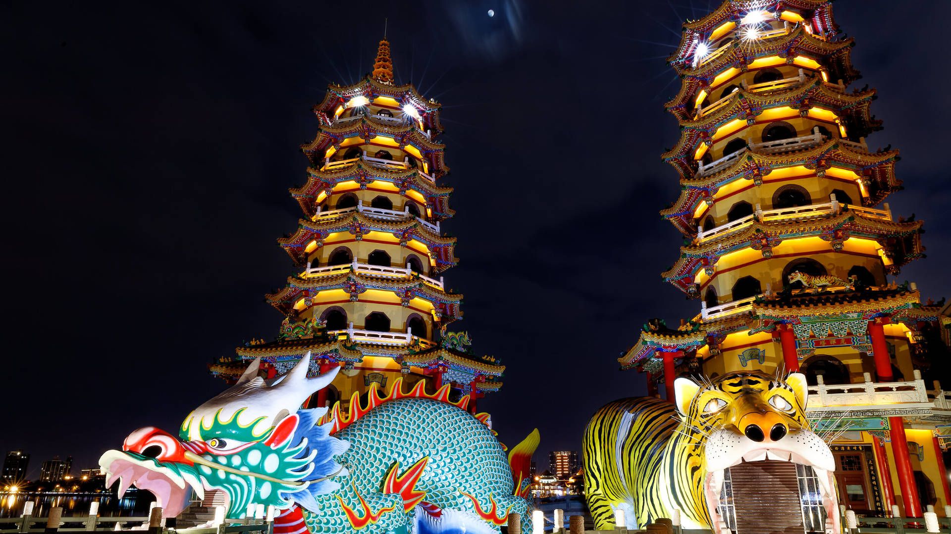 Night-time photo of the Dragon and Tiger Pagodas at Lotus Pond, Kaohsiung.