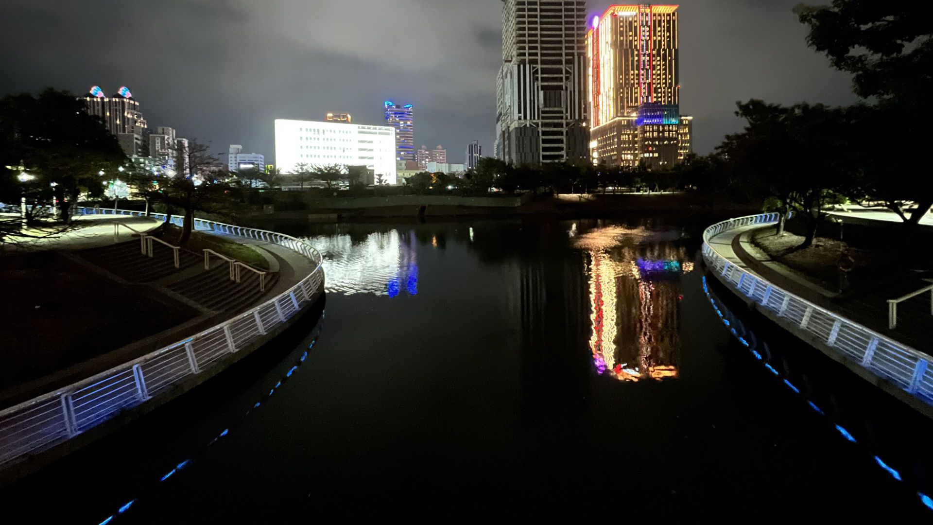 A nighttime view of one of the lakes at Heart of Love River.