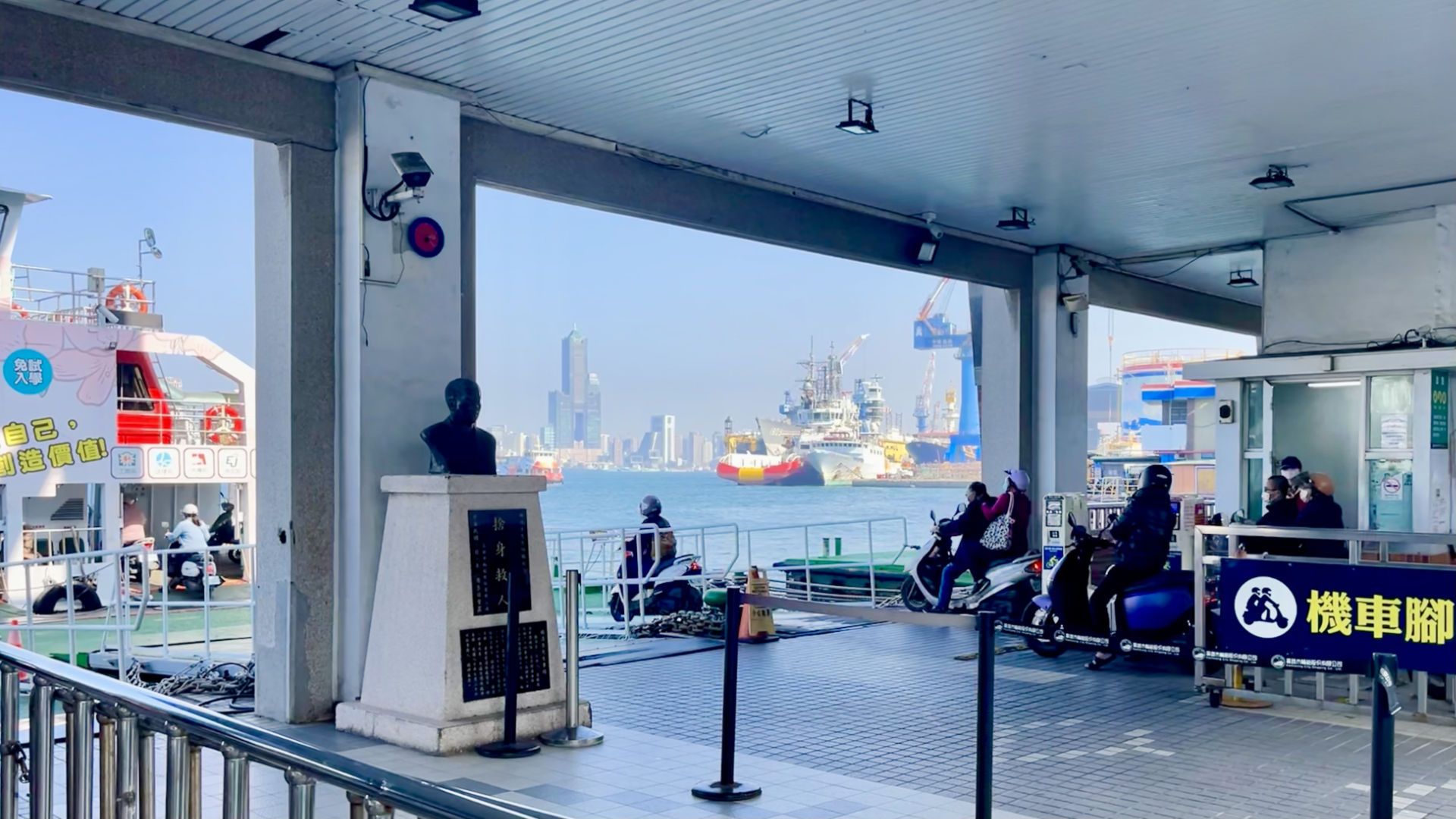 Scooters being driven onto the Cijin Island ferry.