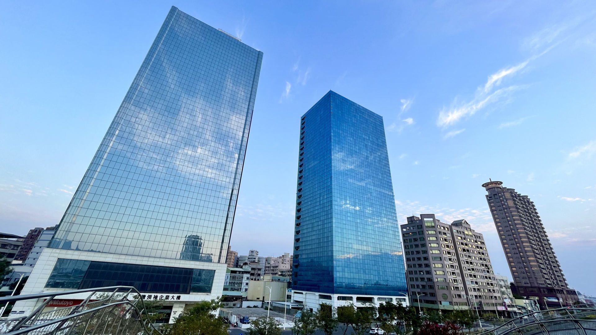 Two glass skyscrapers at Glory Pier.