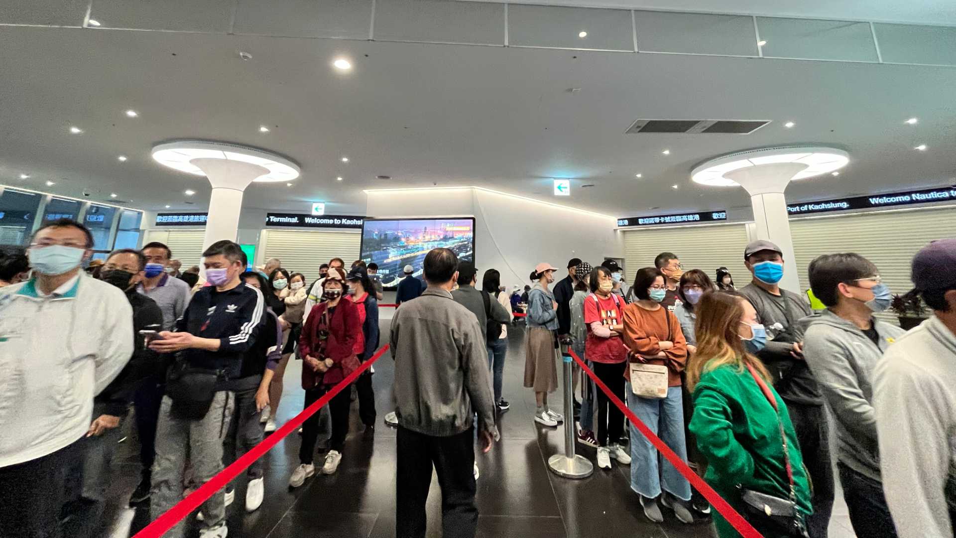 A snaking queue inside the terminal building.