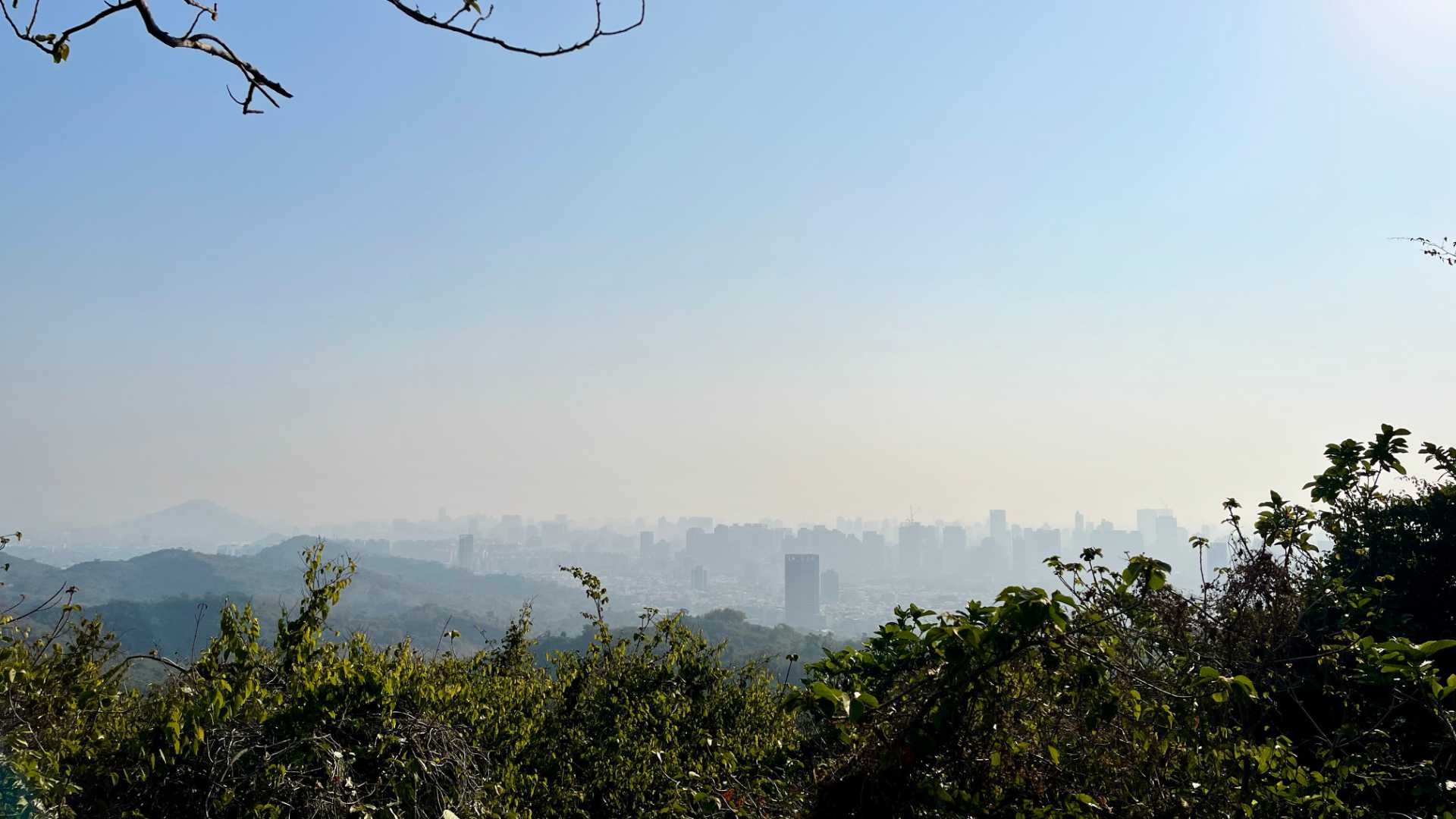 View of Kaohsiung from Monkey Mountain. The city buildings are hazy, in smog.