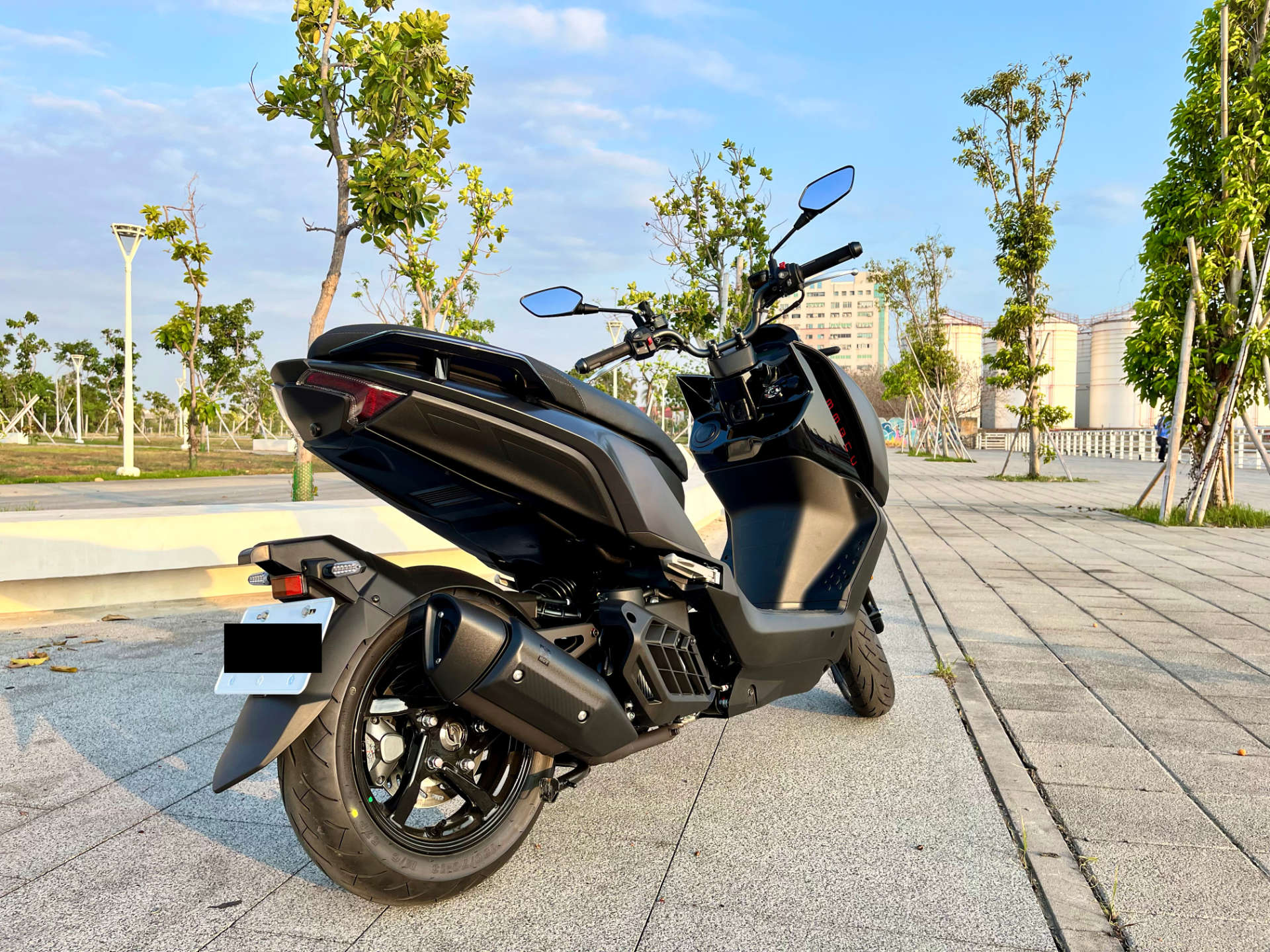 Rear view of an SYM MMBCU scooter.