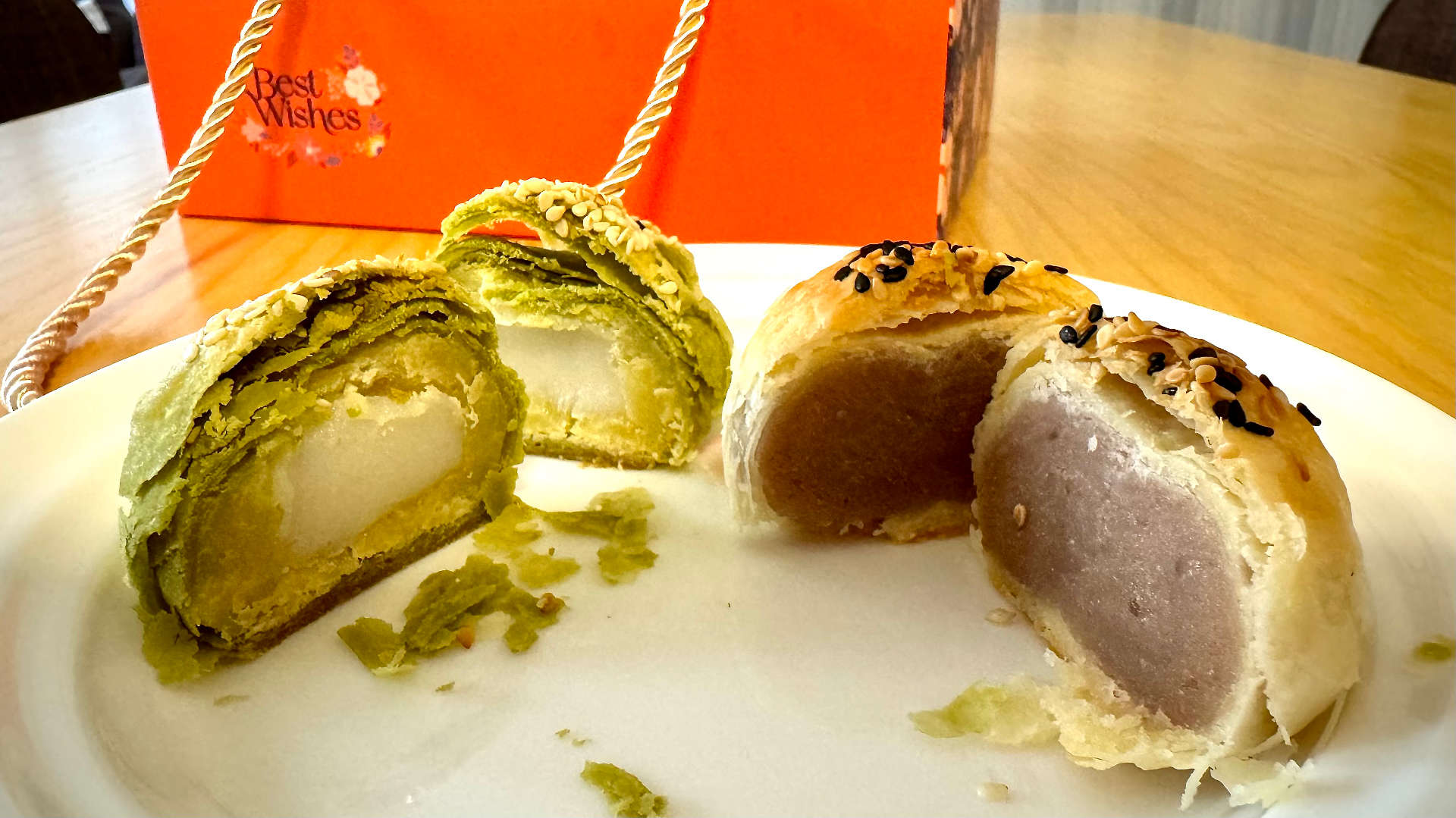 Two sliced-open vegan mooncakes.