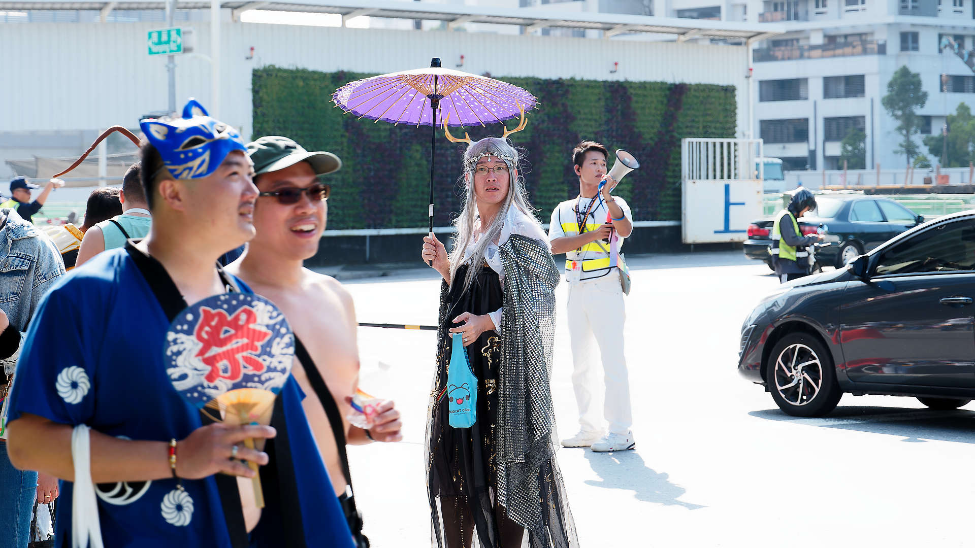 Person in costume, walking in the Kaohsiung Pride parade.