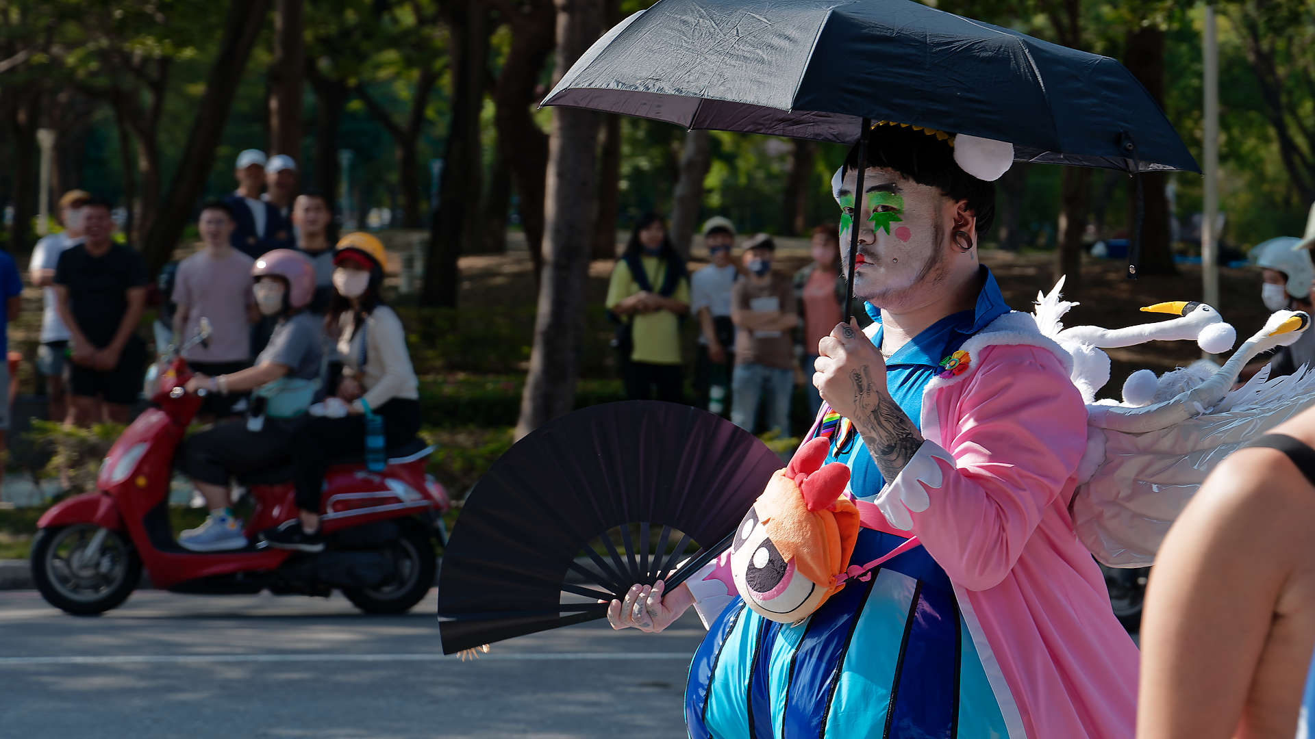 Person in costume, walking in the Kaohsiung Pride parade.