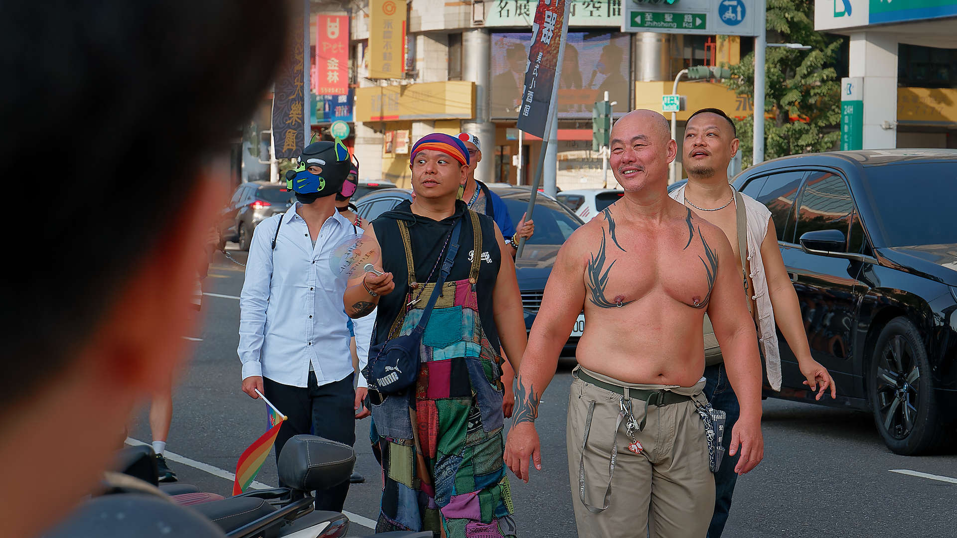 Group of men walking at Kaohsiung Pride.