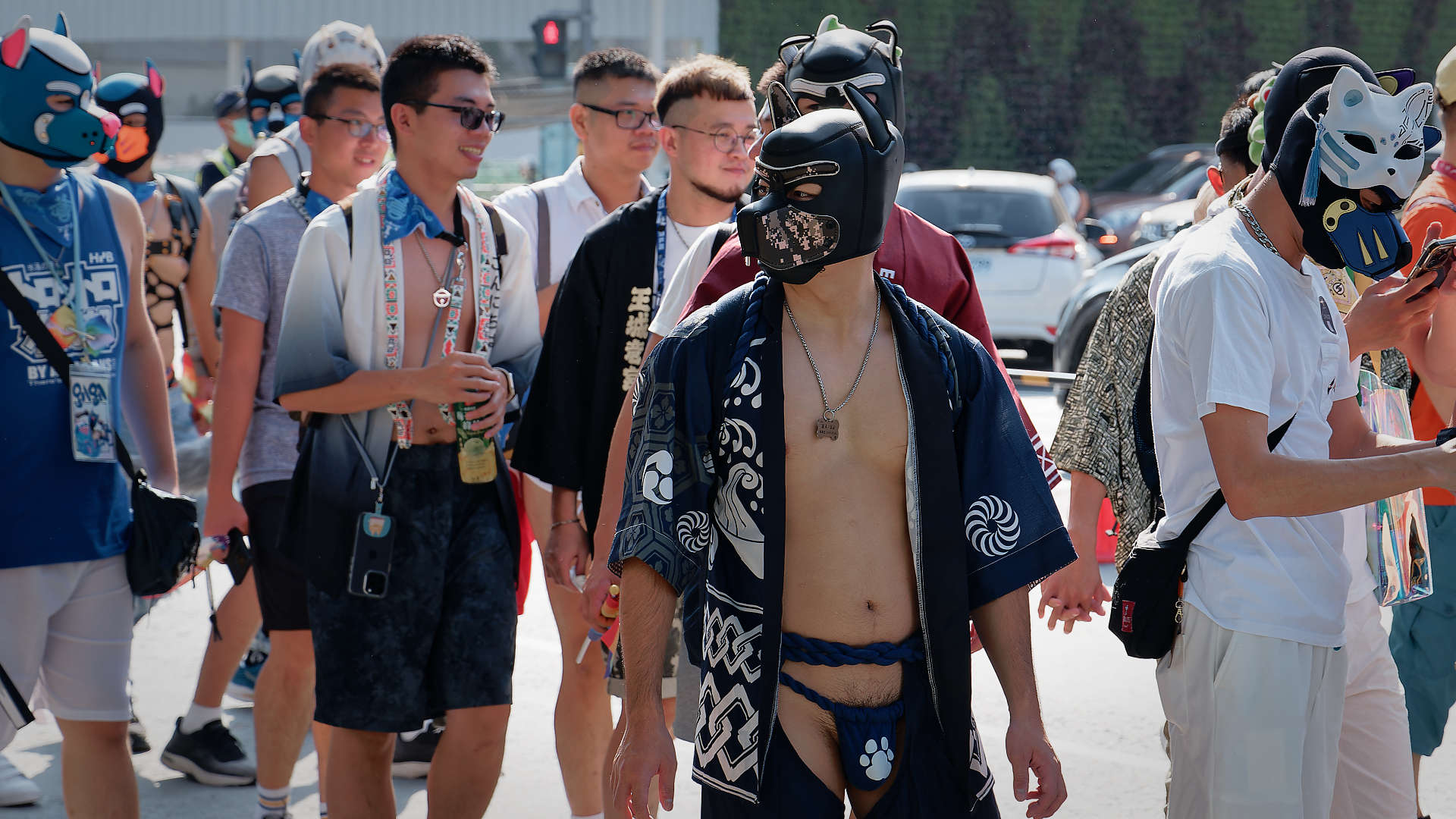 Person wearing a pup mask in the Kaohsiung Pride parade.