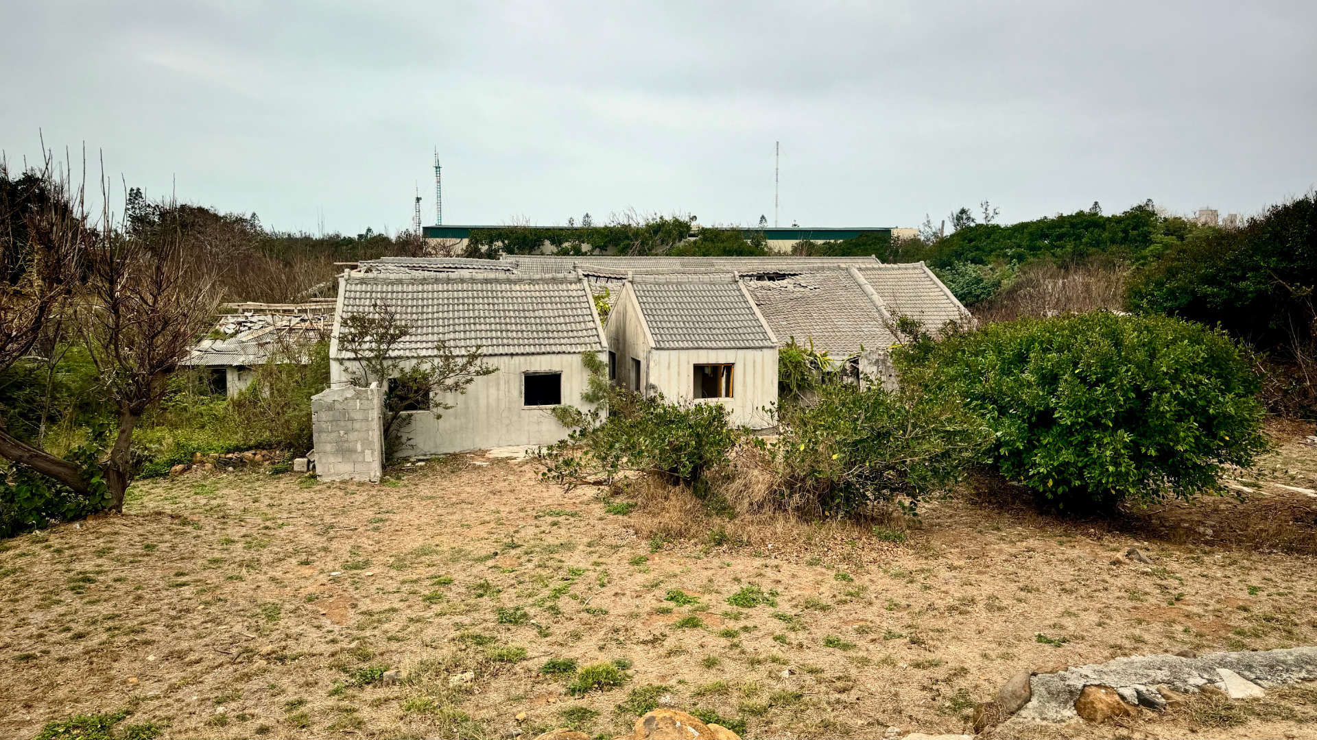 An abandoned village of concrete houses.