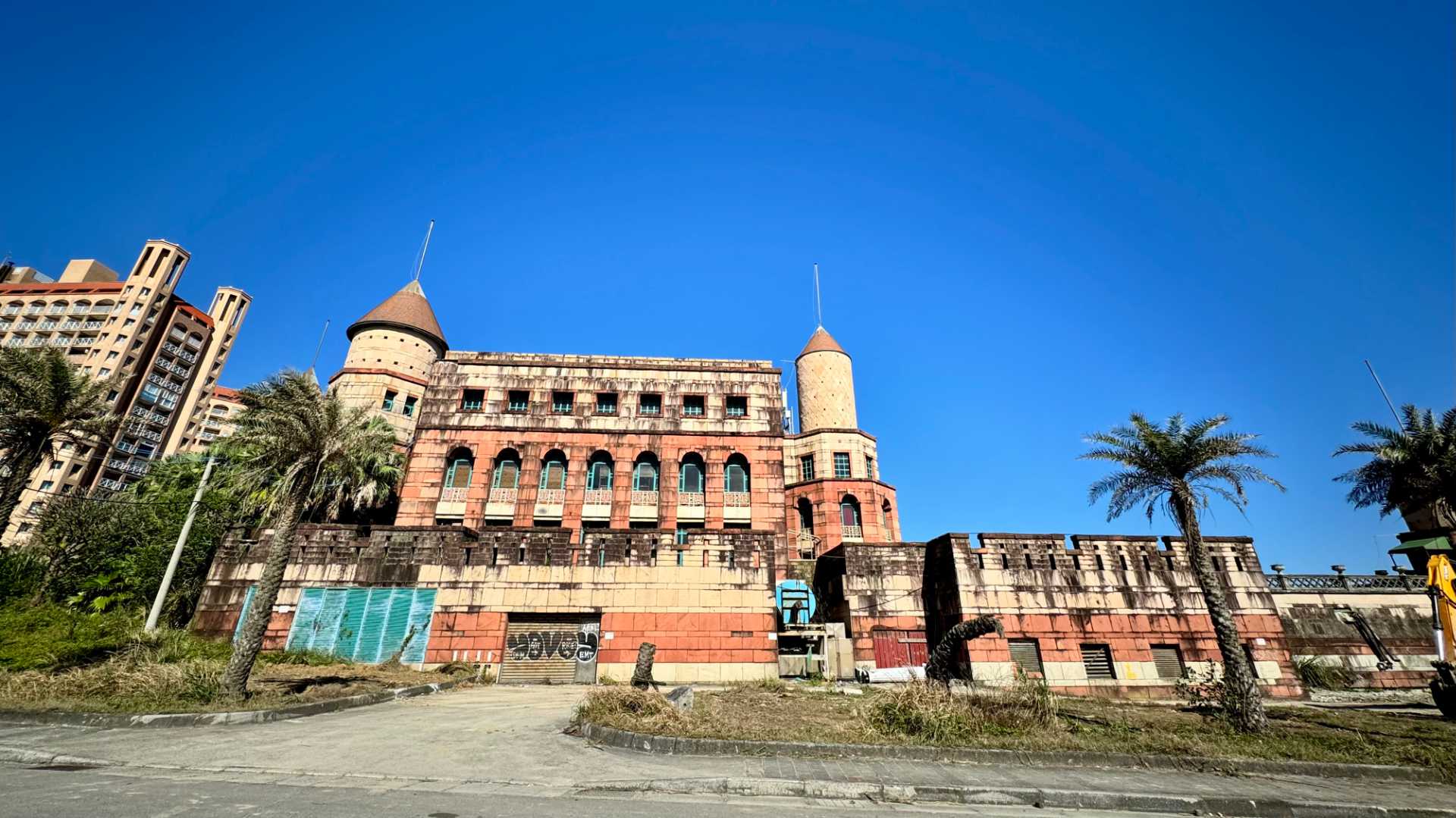 An abandoned five- or six-story hotel near Wanli UFO village in Taiwan.