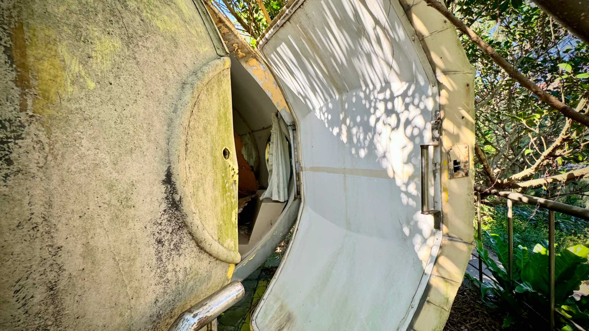 Close-up of a Futura door half-open, at Wanli UFO Village in Taiwan.