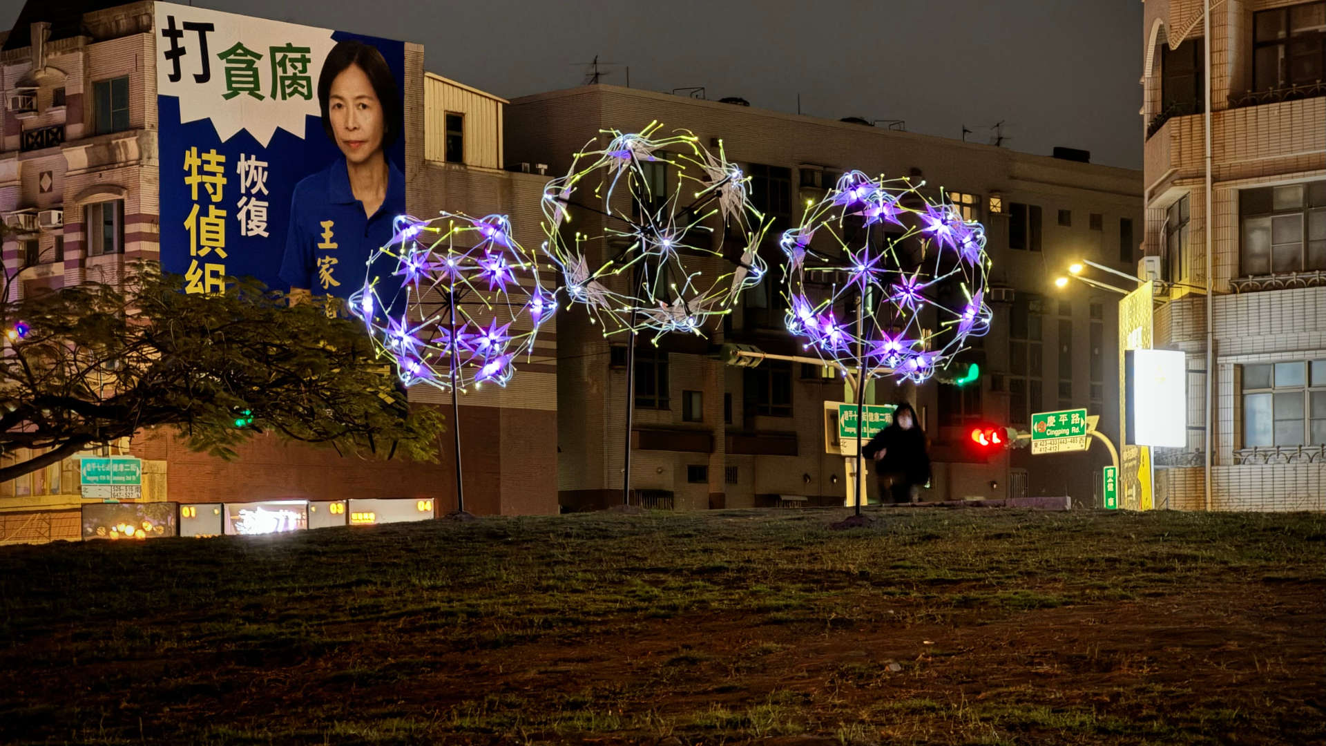 Three abstract sculptures shaped like enormous metal dandelions.