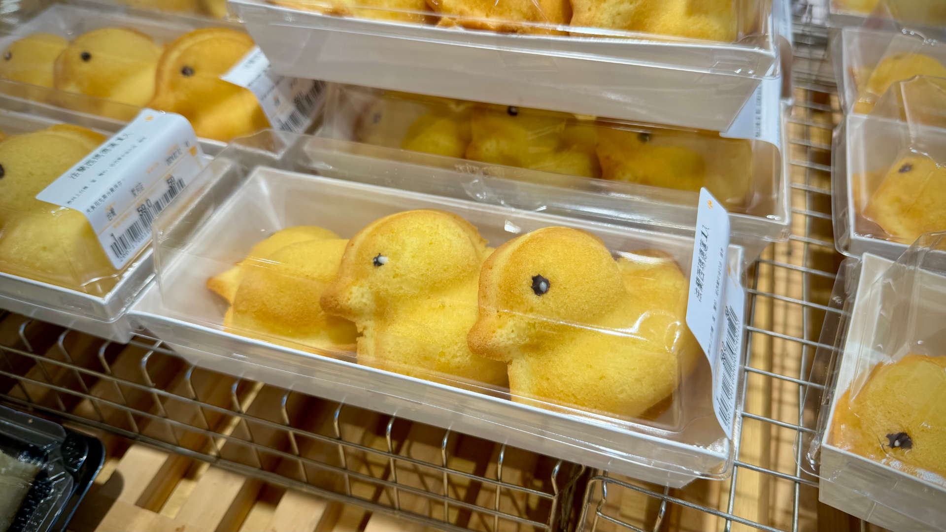 Yellow duck-shaped cakes in packs of three.