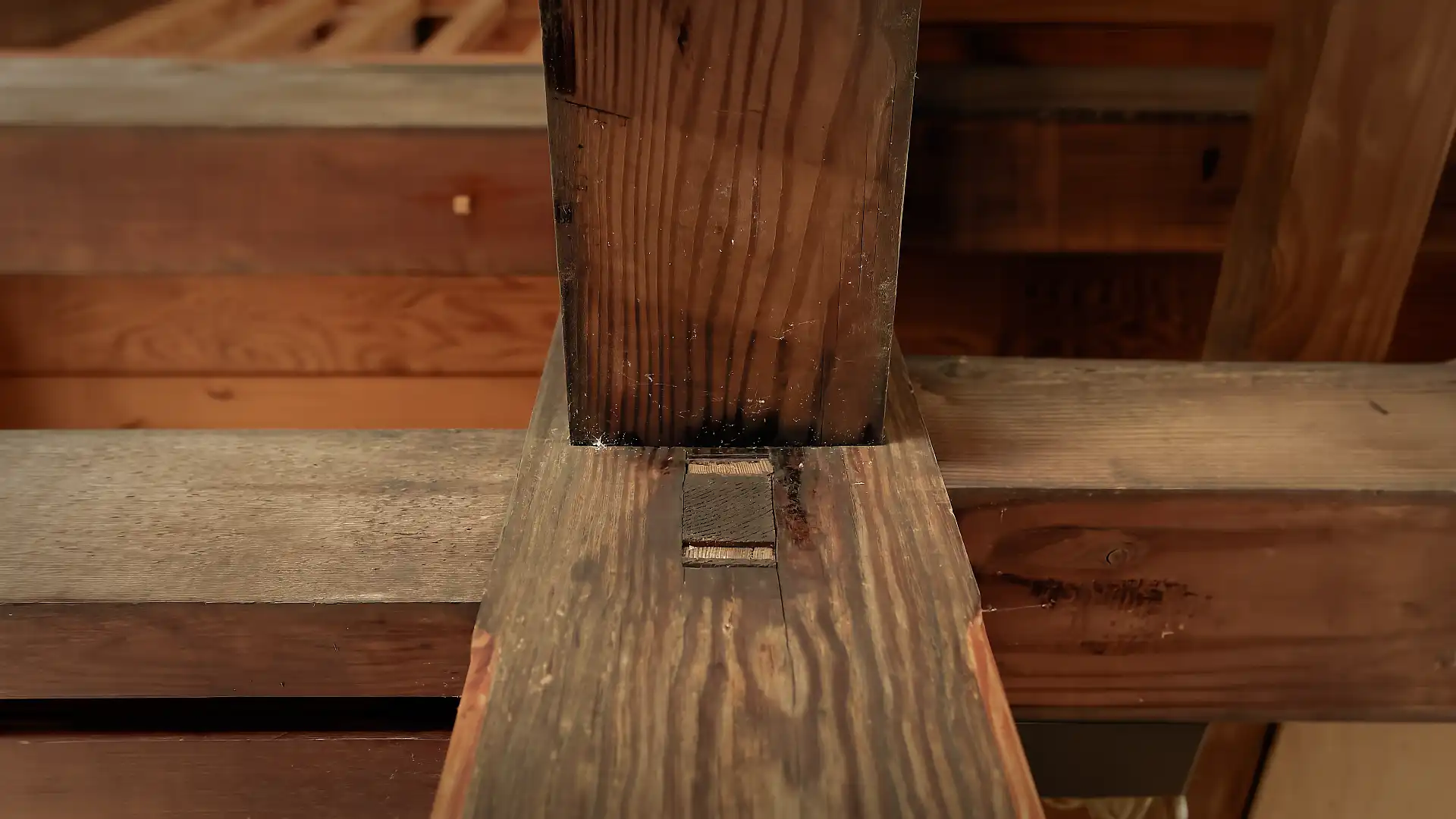 Close-up of wood joinery in the attic.