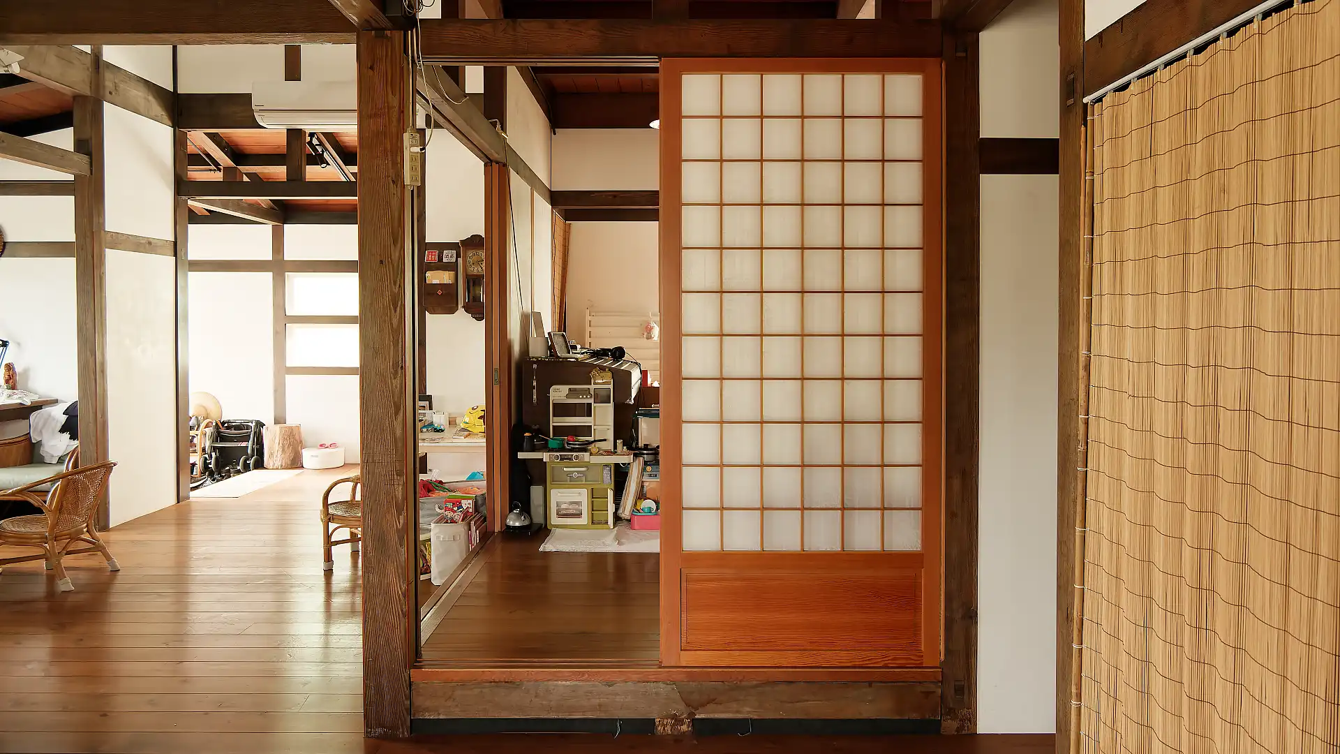 Wide-angle interior view of circulation spaces within ‘A Book Wooden House’.