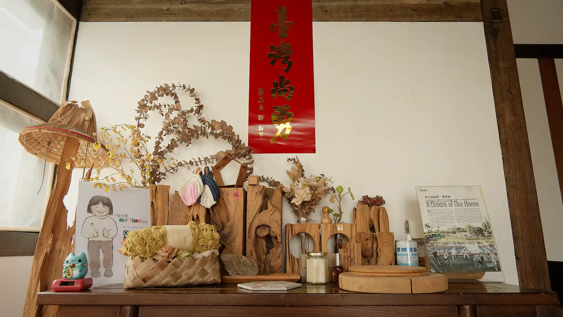 Close-up of a wooden side table covered in wooden tchotchkes.