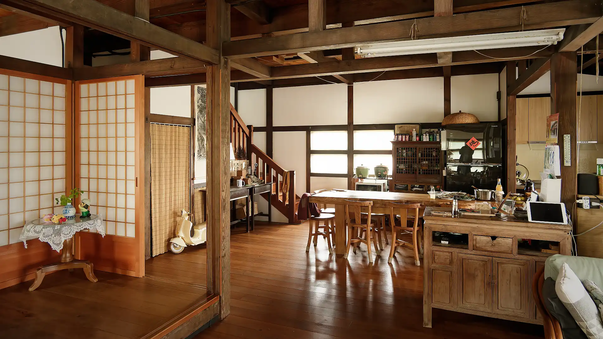 Wide-angle interior photo of the main living space in ‘A Book Wooden House’.