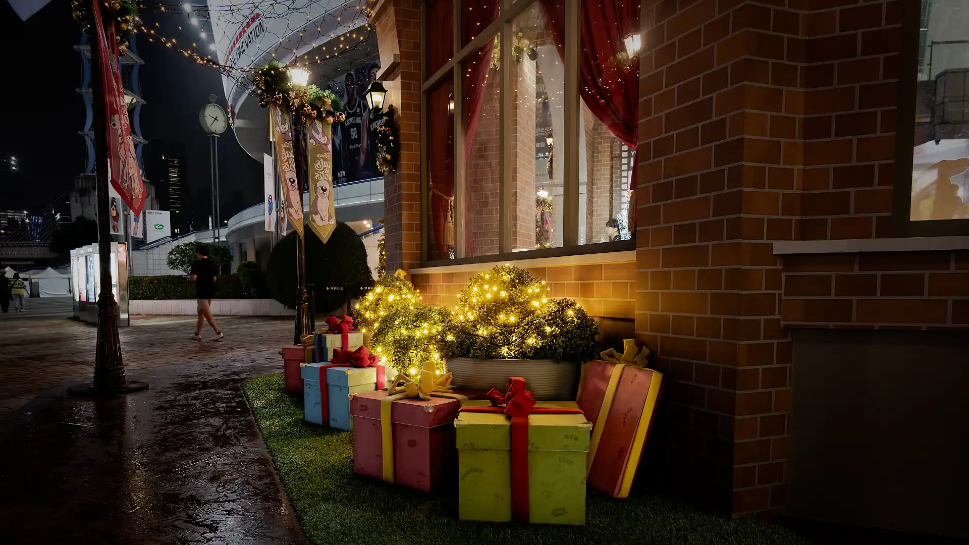 A colorful sculpture of a bunch of Christmas gift boxes.