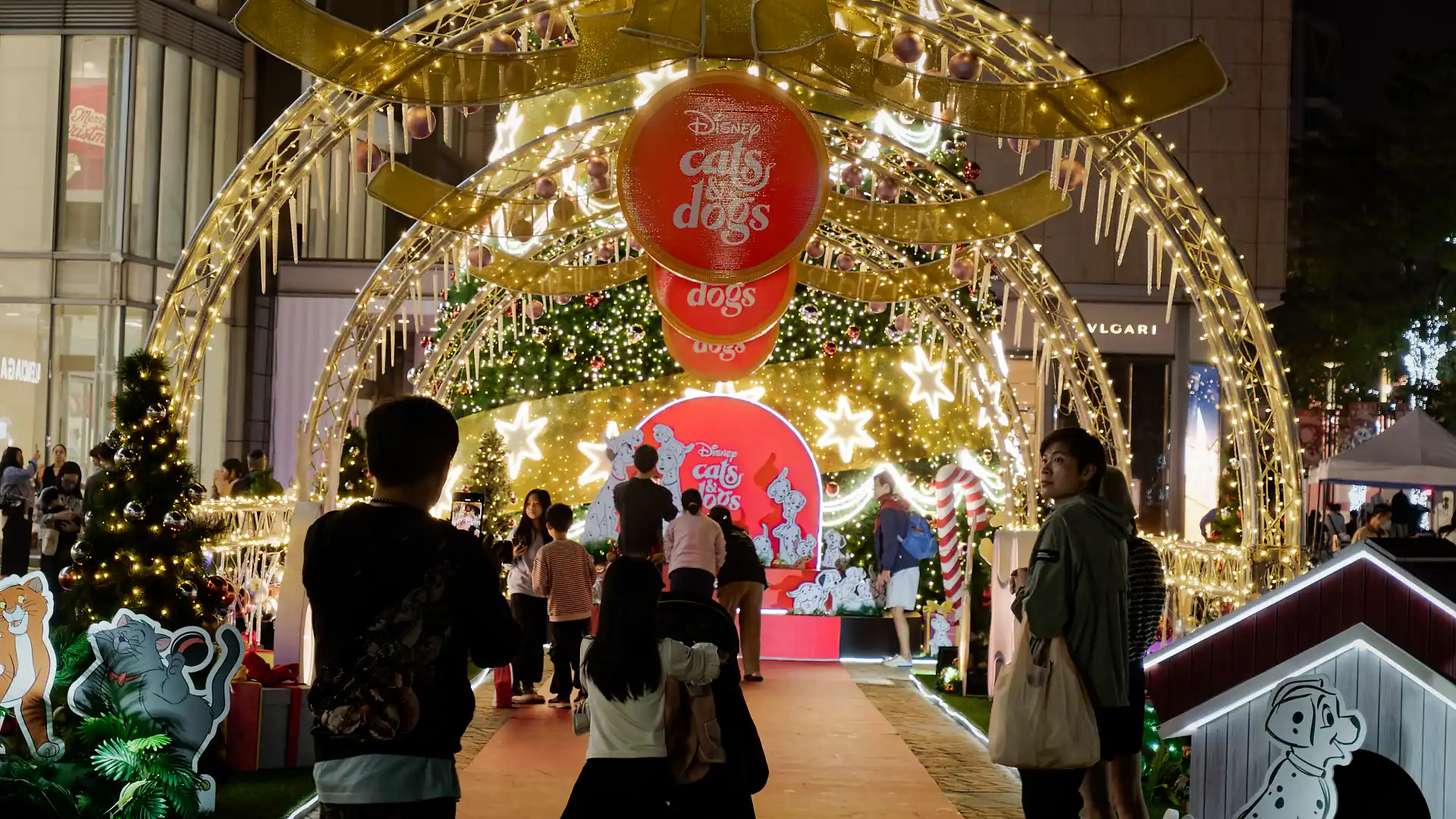 Close-up of a light tunnel with Disney cats and dogs branding.