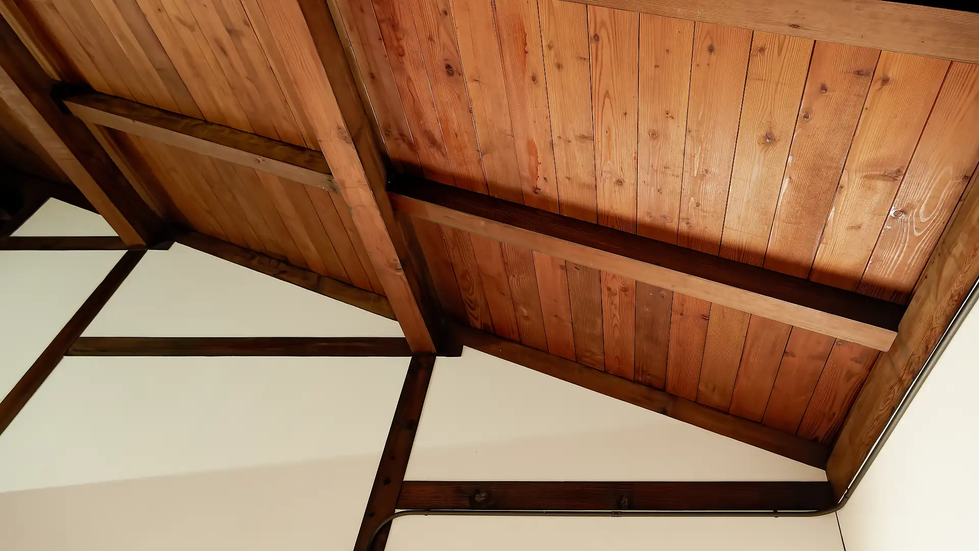 Detail of a raked wooden ceiling.