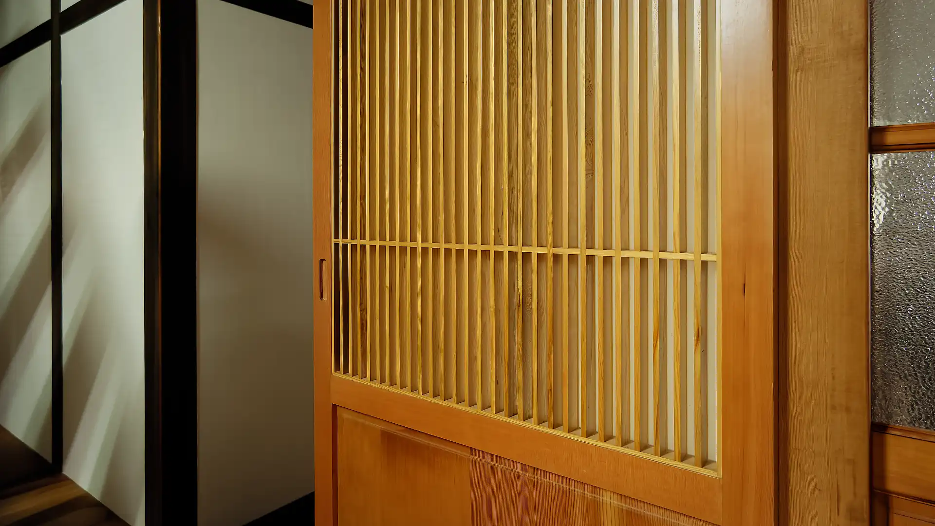 A sliding wooden door.