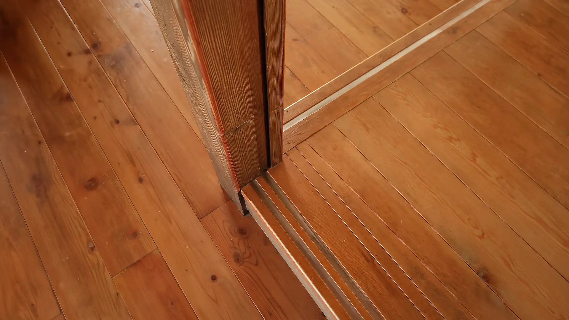 Close-up of the wooden floor in ‘A Book Wooden House’.