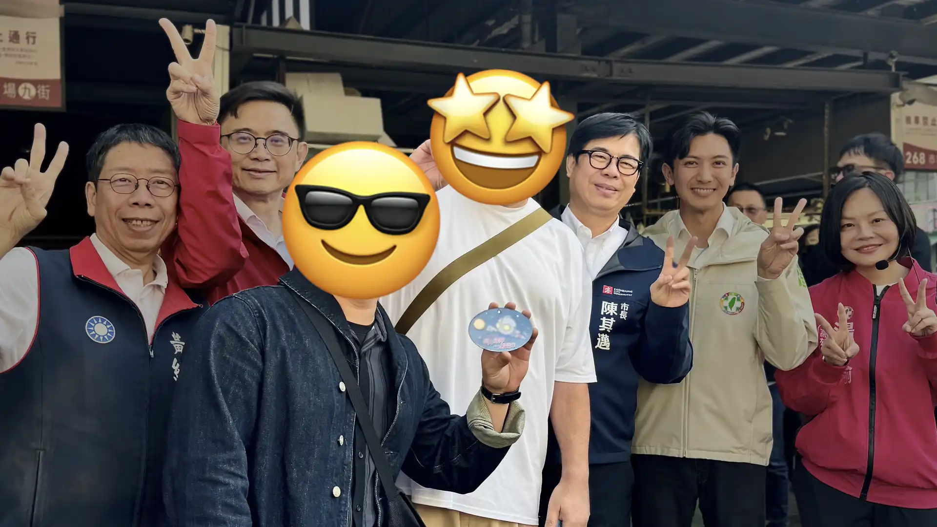 Five politicians, including Kaohsiung mayor Chen Chi-Mai, pose with two members of the public.