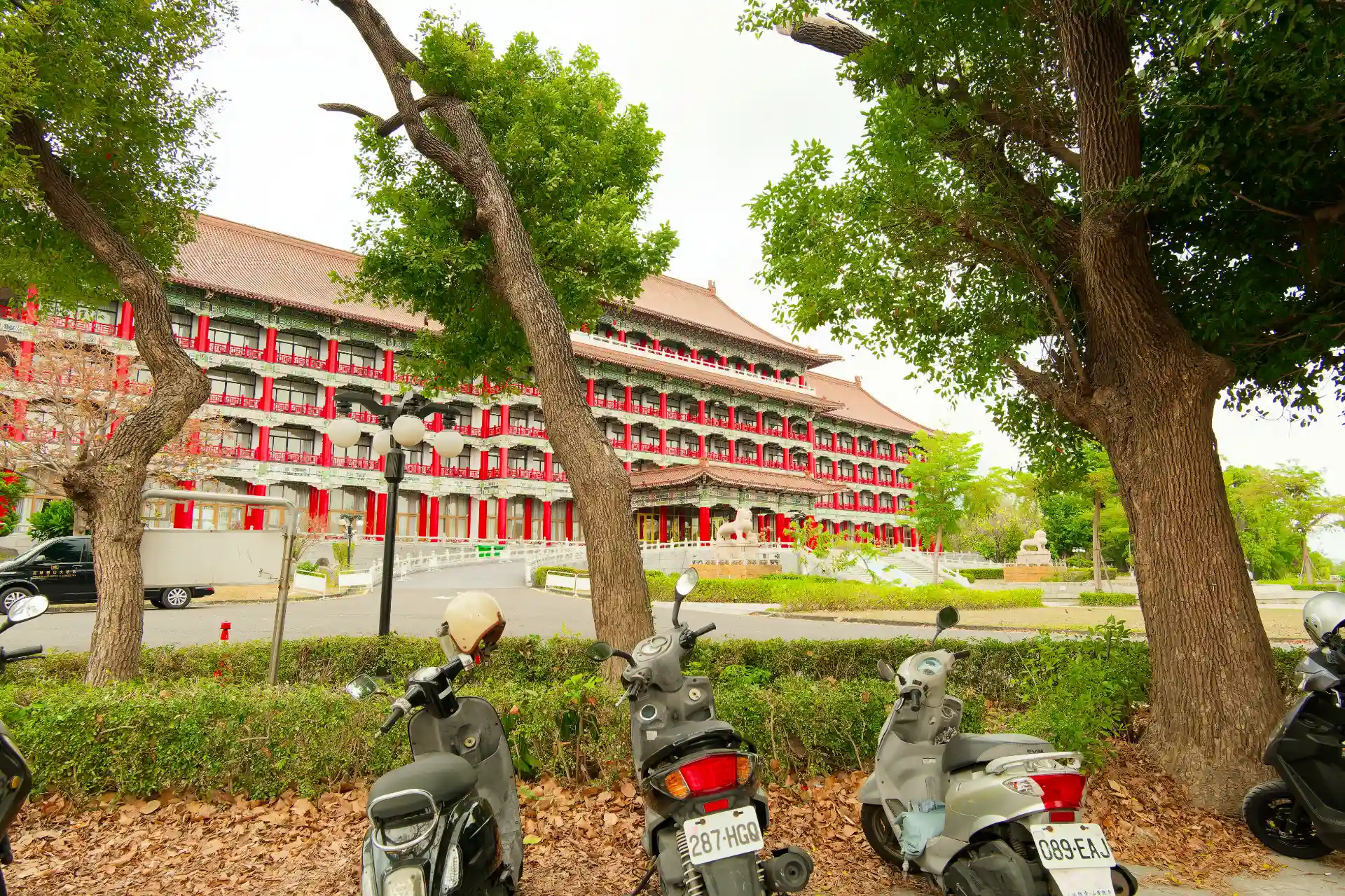 Scooters parked outside the front of the Kaohsiung Grand Hotel.